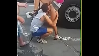 A Man Gives Oral Pleasure To A Woman In Public